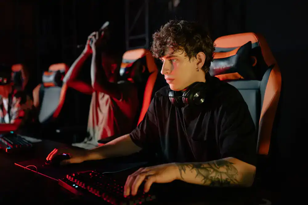 Esports players communicating and strategizing over a digital map terminal